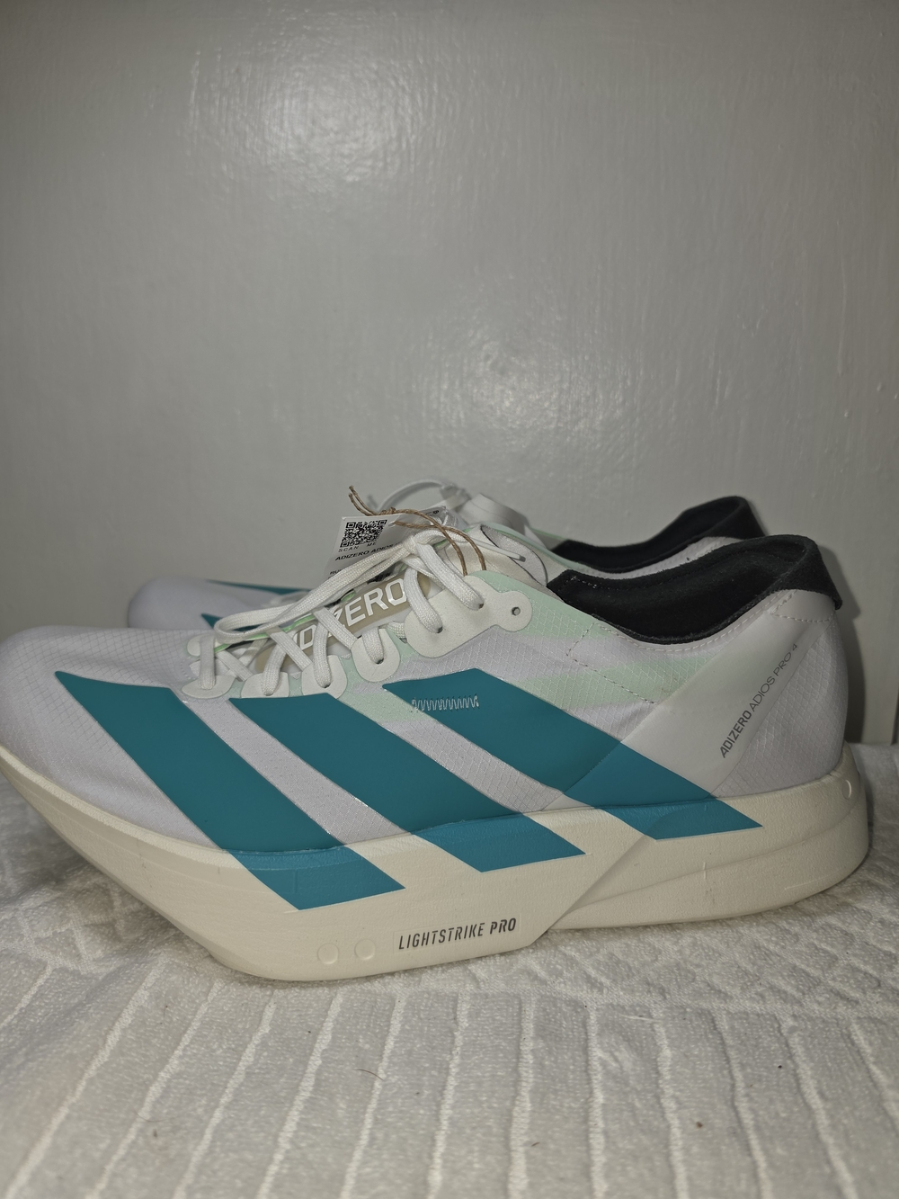 Adidas Adios Pro 4 Lightstrike Pro Running Shoes - White with Teal Stripes